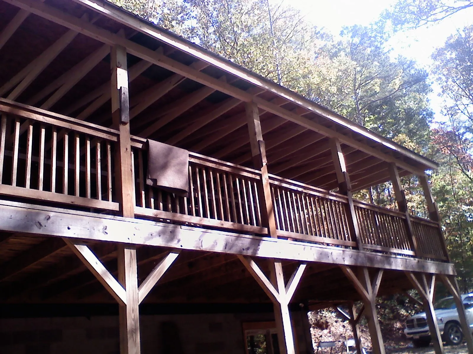 Timber framing under a new elevated porch and deck — Roof Leak Repair in Elberta by Roofing Brothers
